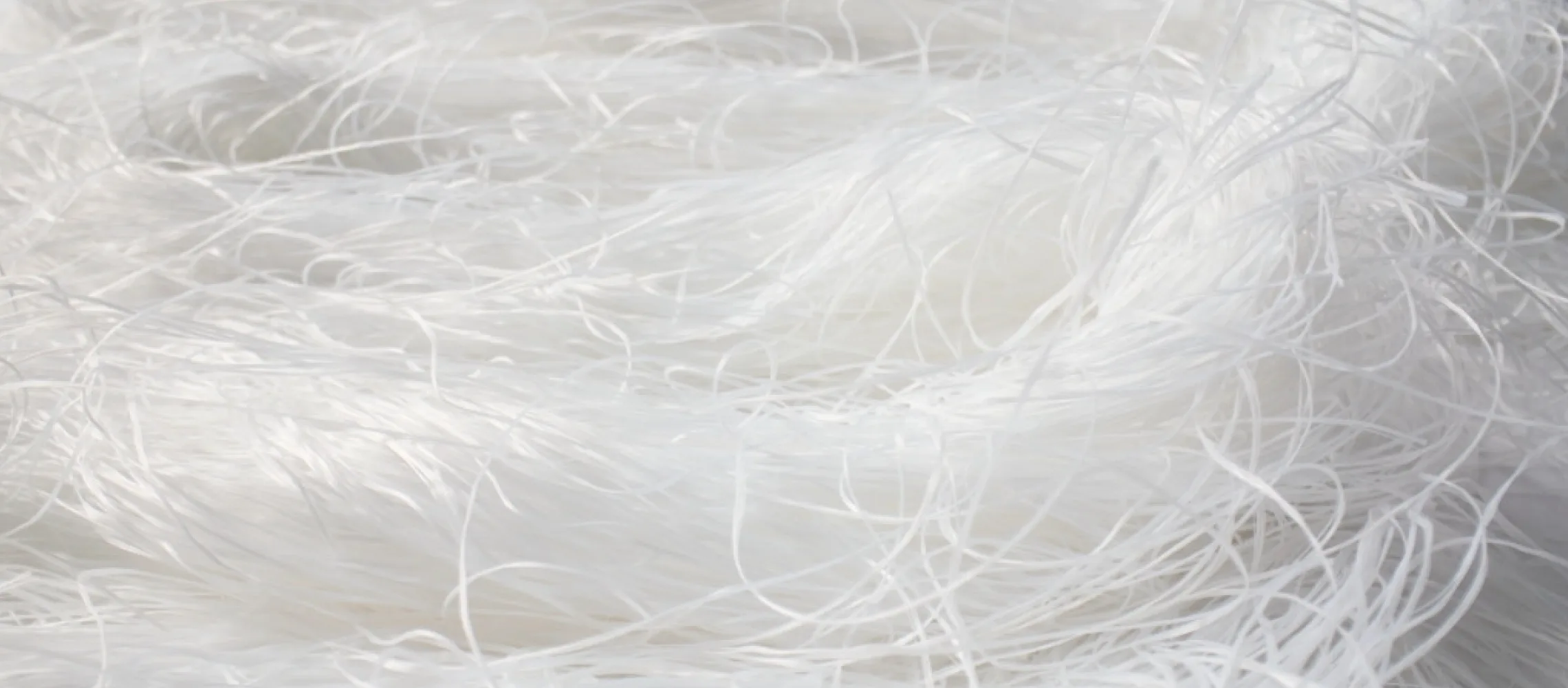 White tangled yarn feature image